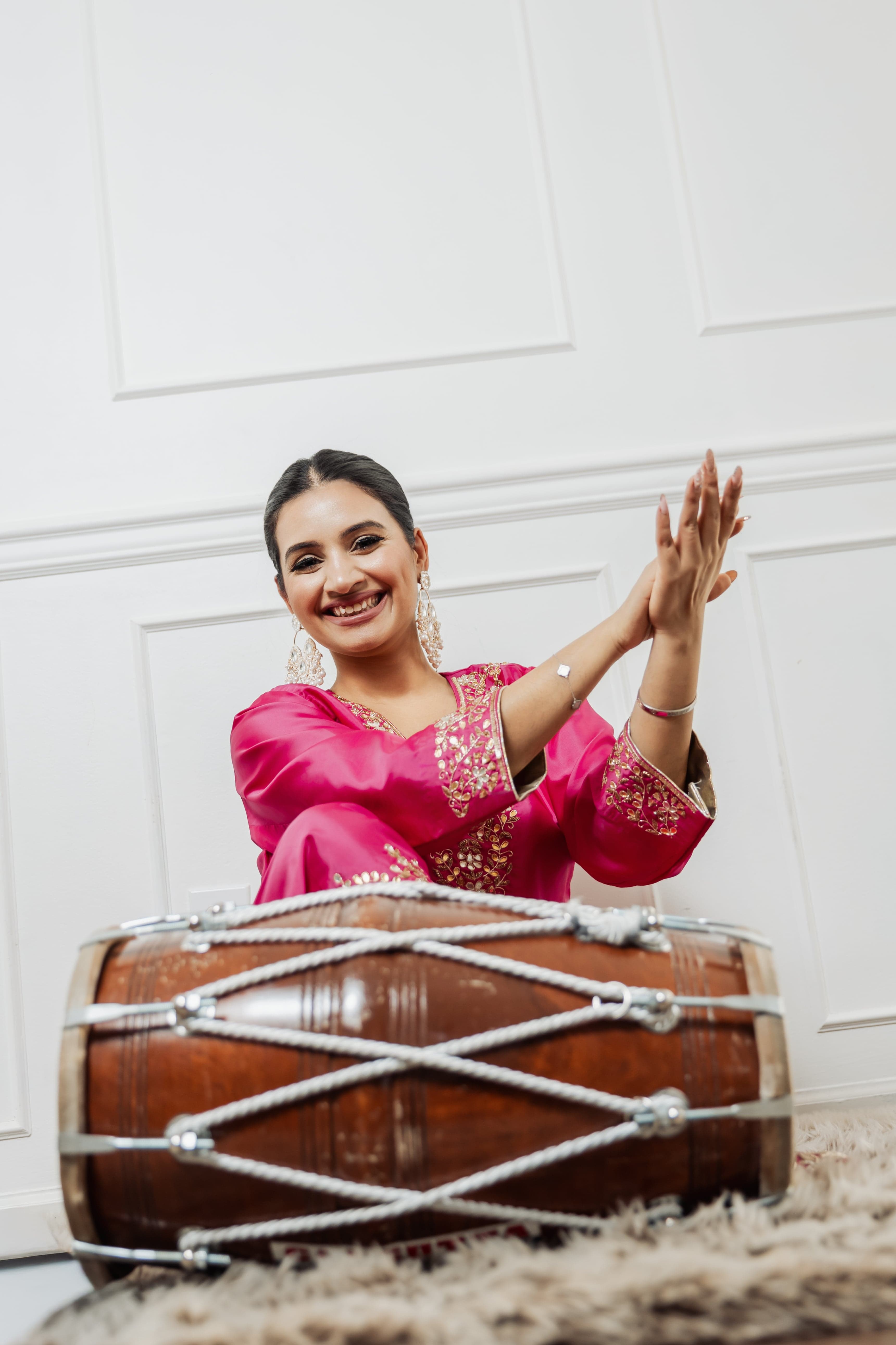 Clapping Behind Dhol